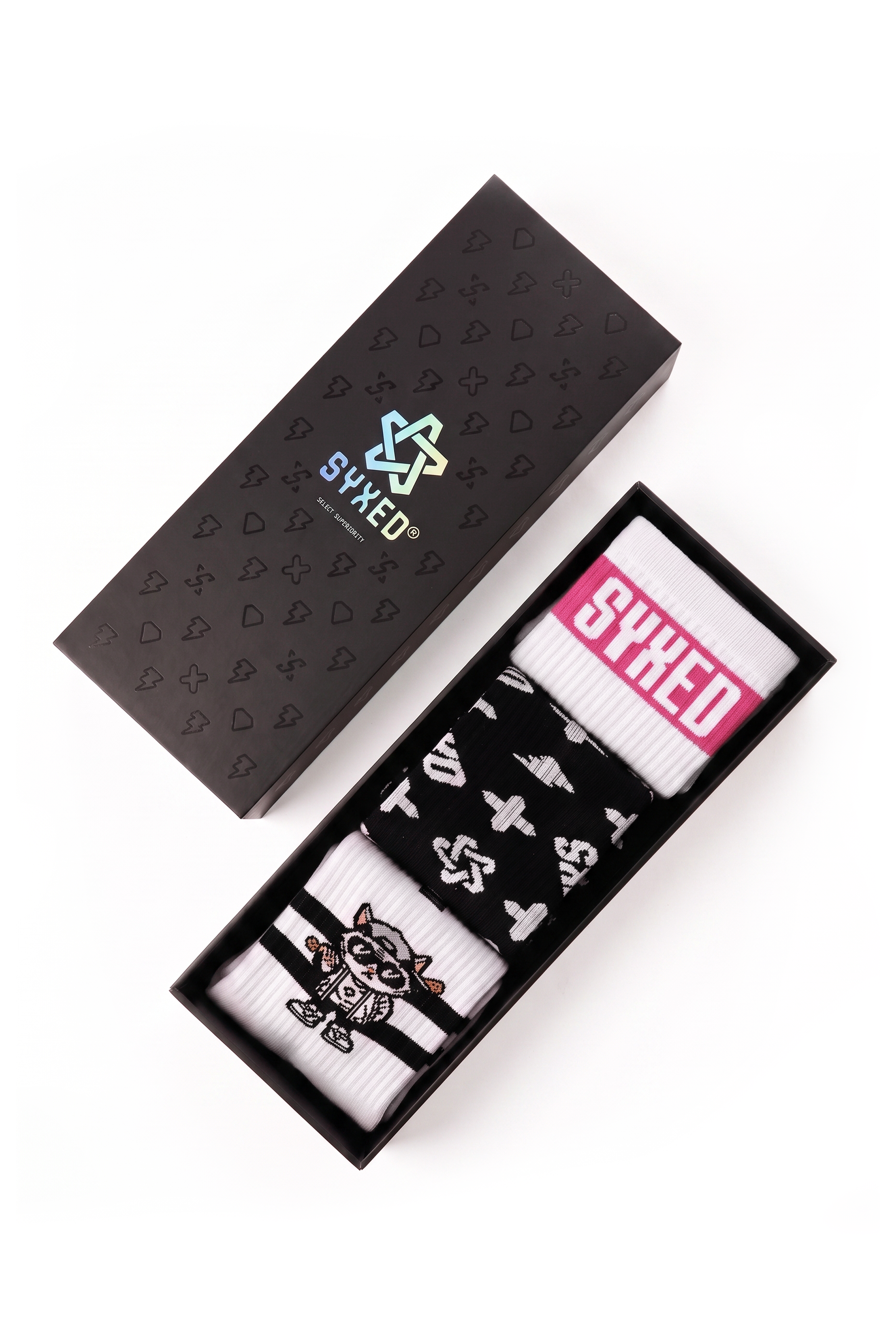 A boxed pair of patterned socks displayed on a white background, with the black presentation box lid above and the open box below showing white, black, and pink socks.