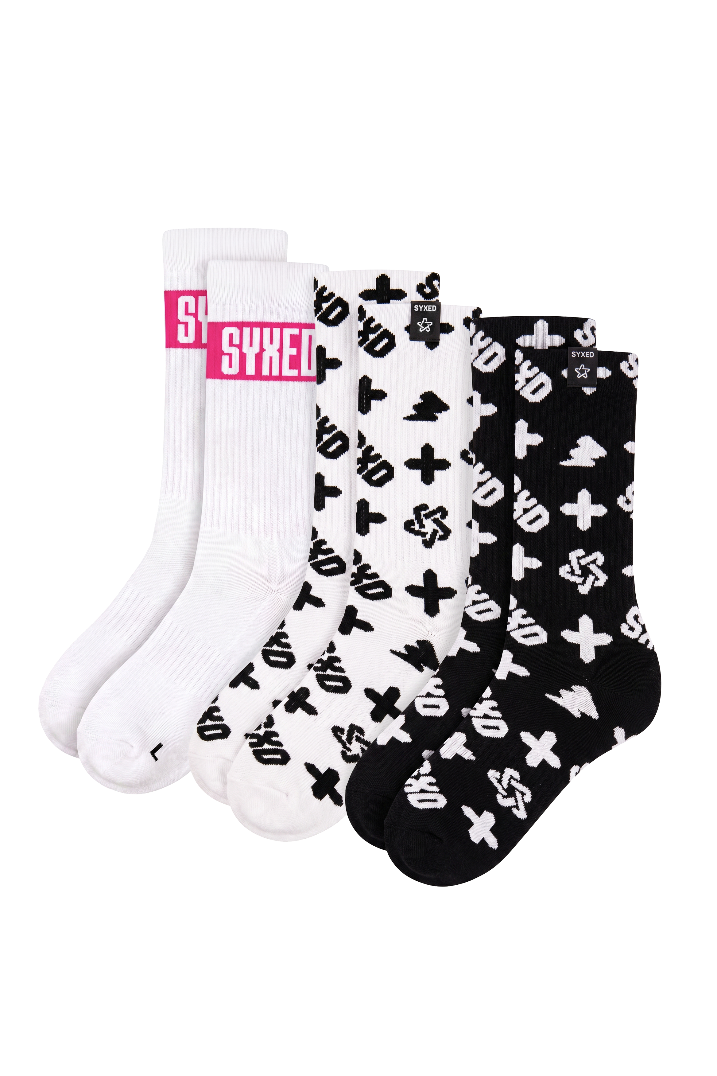 Three pairs of patterned crew socks displayed side-by-side on a white background. The left pair is solid white with a pink and white 'SYXED' logo band.