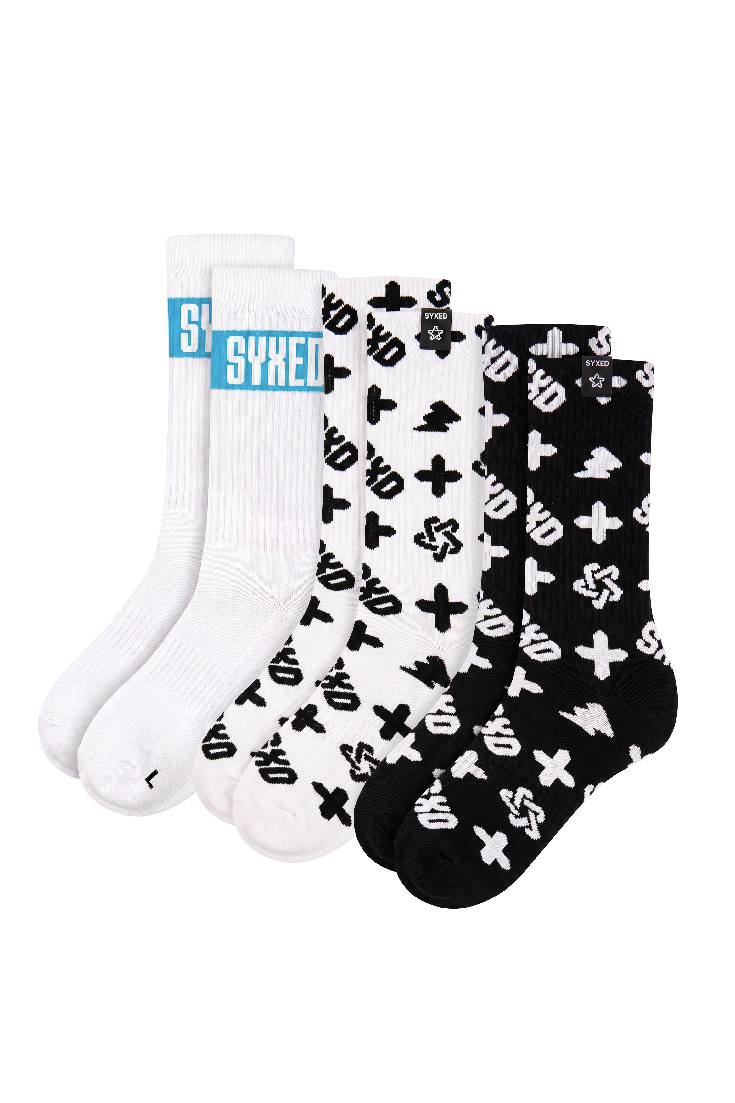A 3-pack of Syxed brand crew socks, featuring two white socks with black graphic prints and one black sock with white graphic prints, displayed against a solid white background.
